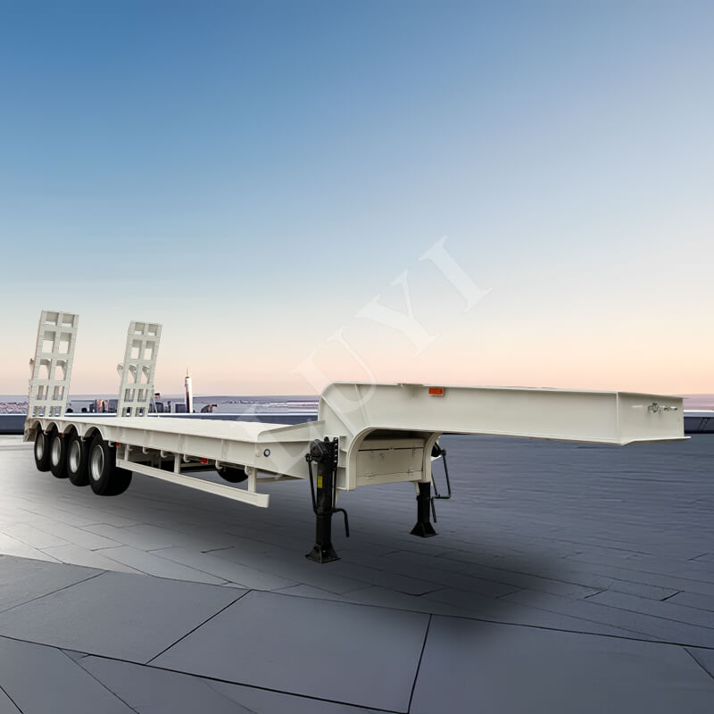 Kraftig 4-axlad lågbäddsvagn med mekanisk stege för transport av tunga maskiner